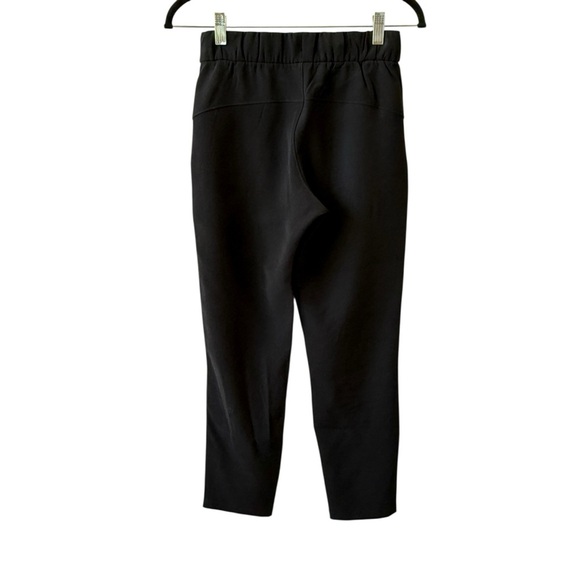 LULULEMON ON THE FLY PANTS TRAVEL WOVEN PULL ON POCKETS WORKOUT ATHLEISURE 2 - Picture 4 of 11